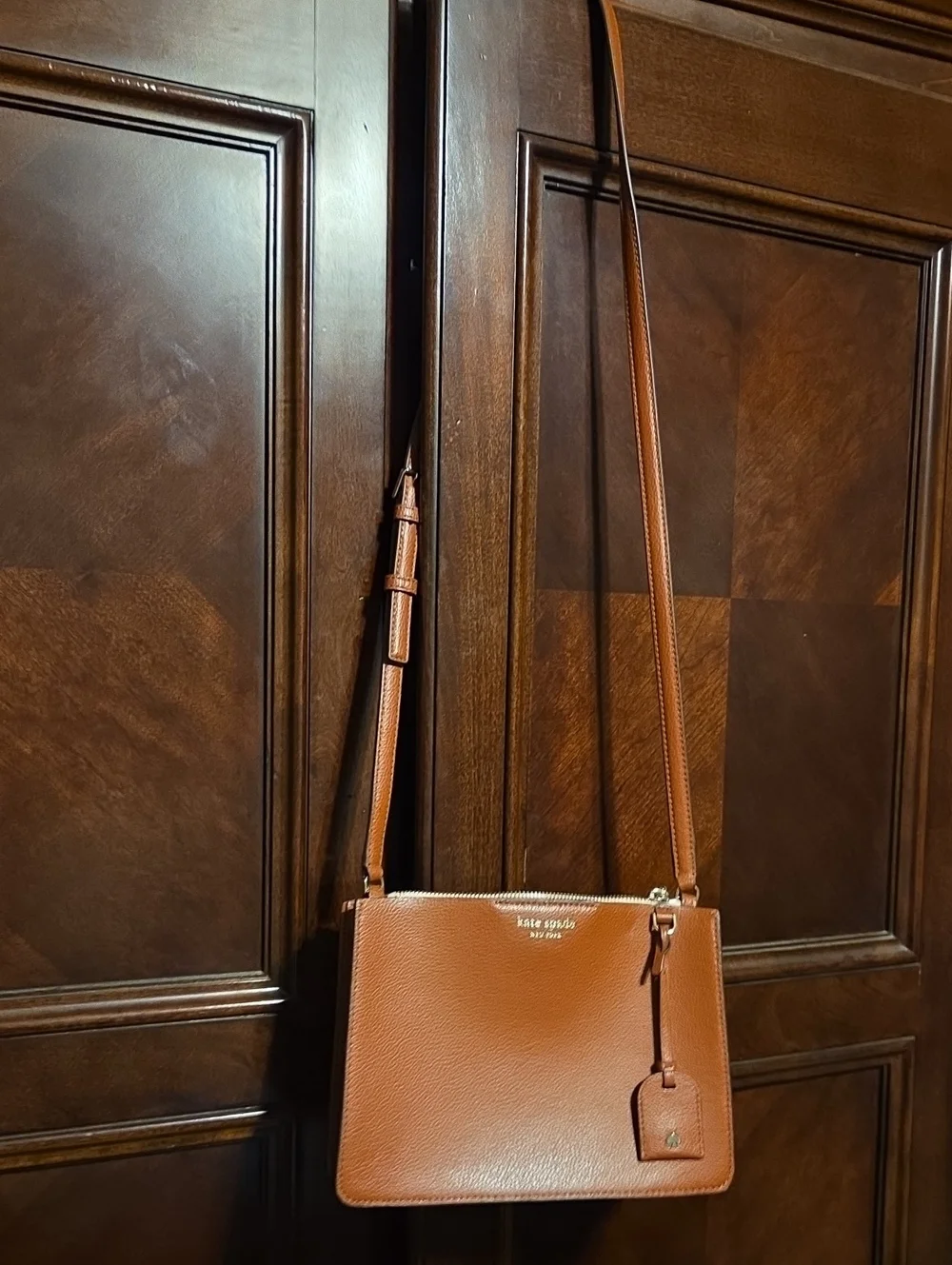 kate spade tan leather crossbody with luggage tag